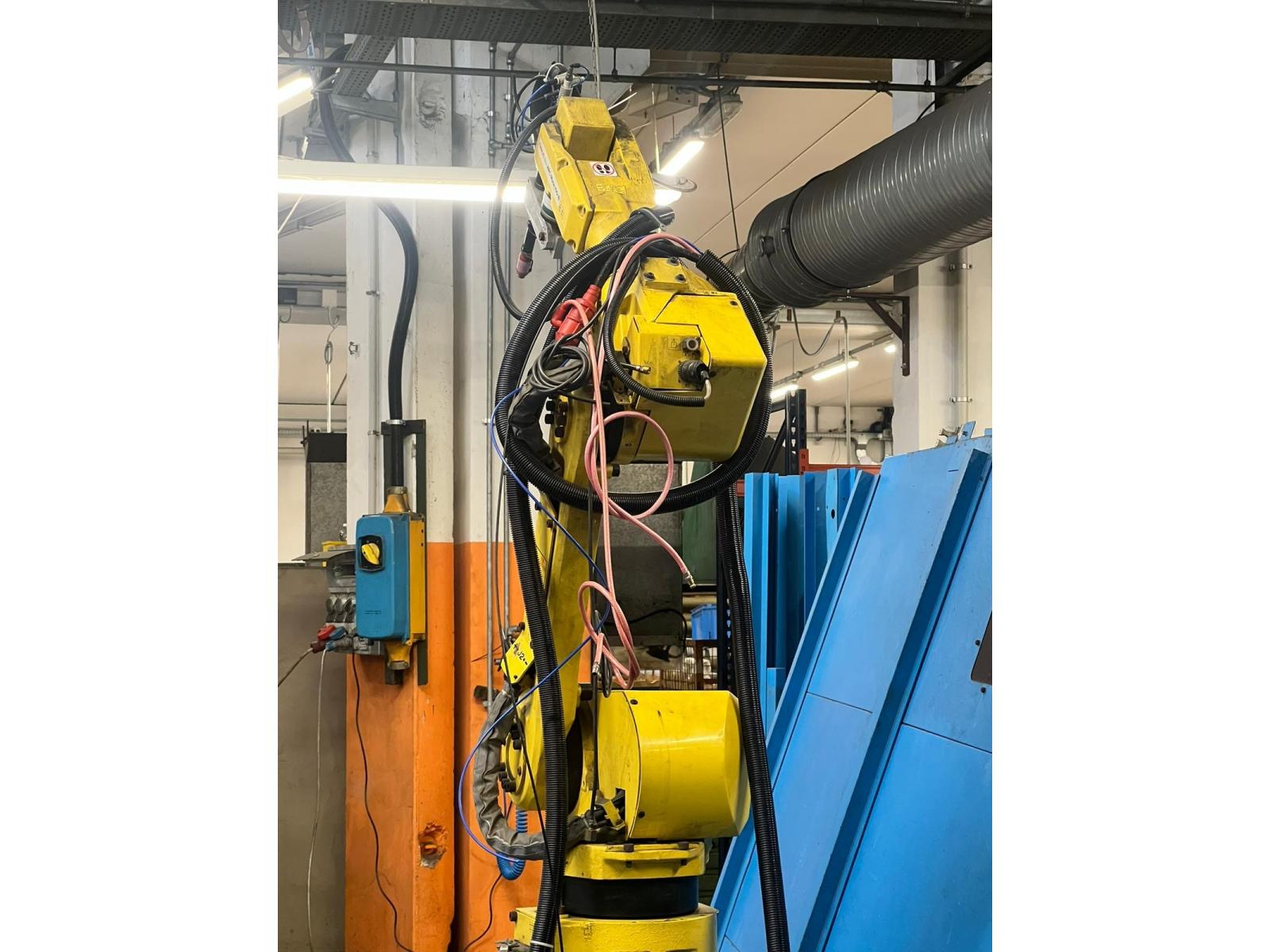 IMPIANTO DUAL ARM CON ROBOT FANIC